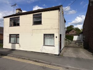 Main Elevation- click for photo gallery